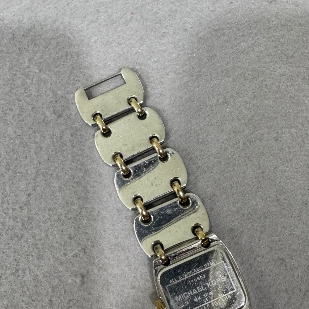 Michael Kors scratches stainless